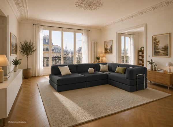 Lyzza Canyon canapé d'angle anthracite dans un salon parisien