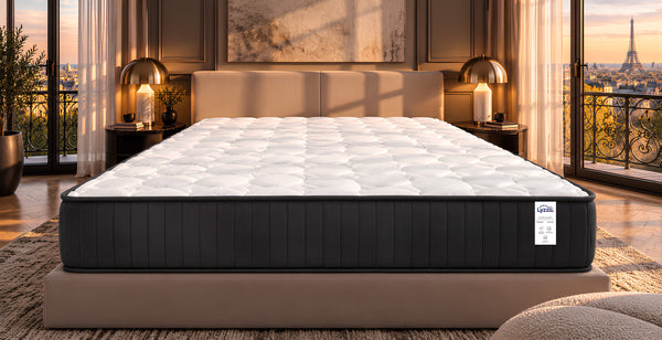 Lyzza Essentiel vu de face : surface matelassée blanche et bordure noire