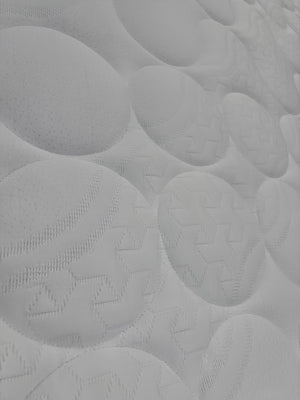 Gros plan sur le tissu tricoté matelassé du Lyzza Essentiel